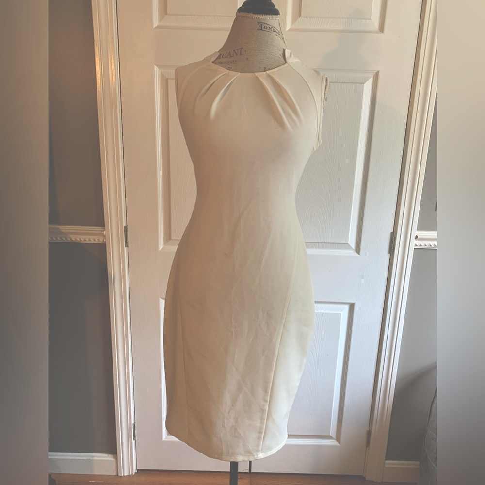 Kardashian Kollection off white keyhole back dress.